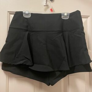 Black skort with flare. Like new, rarely worn.